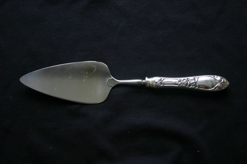 Opphøiet rose paispade/kakespade
