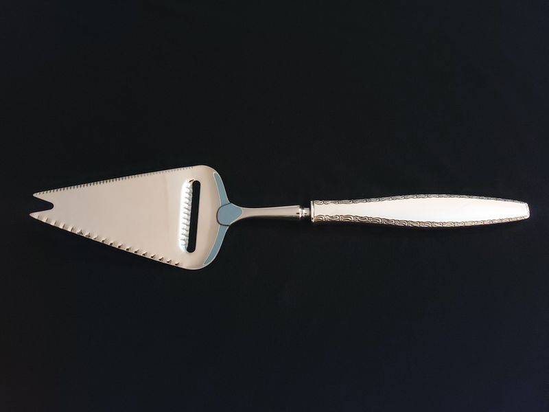 Romanse ostehøvel med kniv